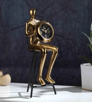 Sitting Man Clock In Gold,